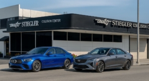 mercedes-sedan-and-cadillac-sitting-in-front-of-Auto-Stiegler-Collision-Center-Reseda-CA